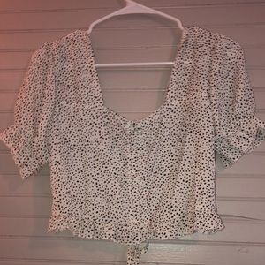 spotted black and white shirt